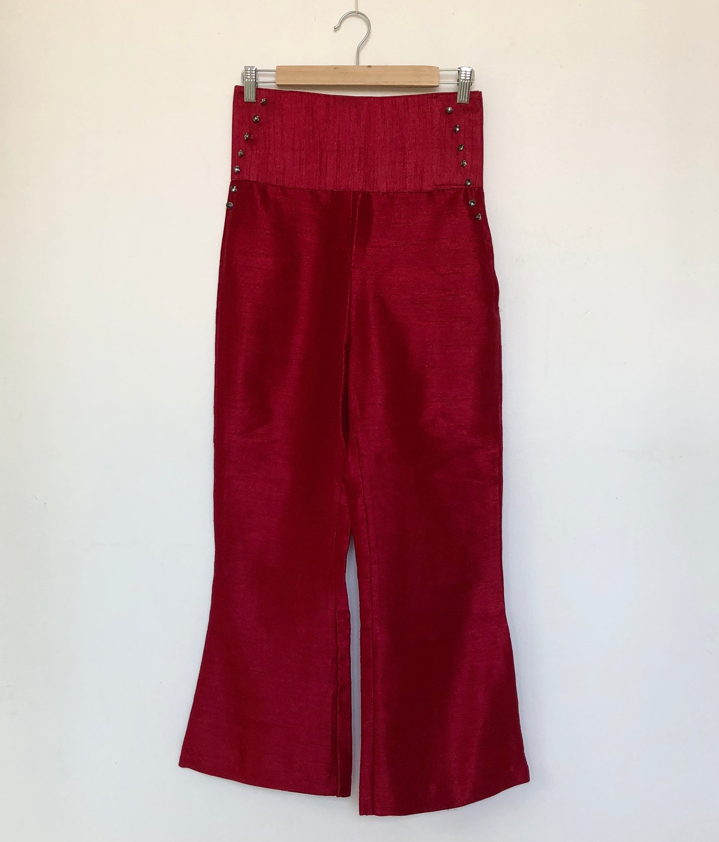 Red bootcut pants